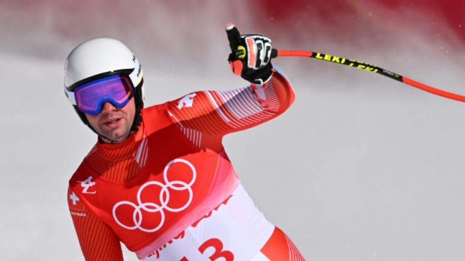 Feuz wins 'dream' Olympic downhill gold as wise heads prevail