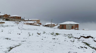 Heavy snow hits Turkey's northeast as southwest burns