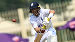 Root's patient ton helps England to 302-7 after early wickets