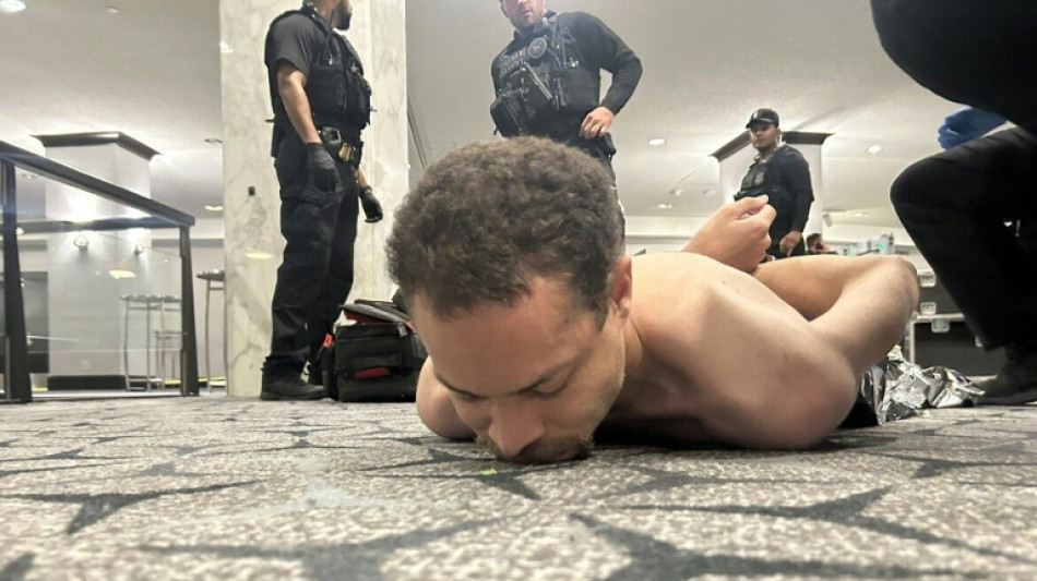 Accused media gala gunman charged with attempting to assassinate Trump