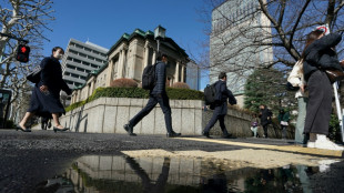 Tokyo stocks rise as BoJ holds rates steady