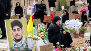 Displaced families bury Hezbollah dead in temporary graves