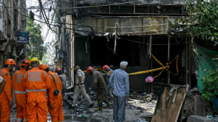 New Delhi hotel blaze kills 21, including foreigners