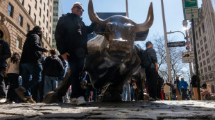 Stocks mixed, precious metals slip in quiet Asian trade