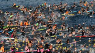 Hundreds swim, float at Bondi Beach to honour shooting victims