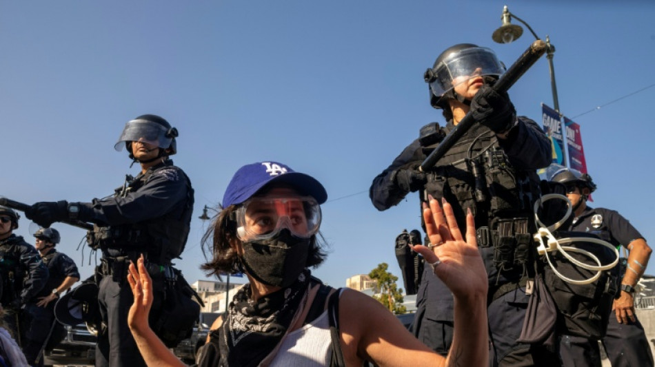 Los Angeles protests simmer as Trump and state officials clash