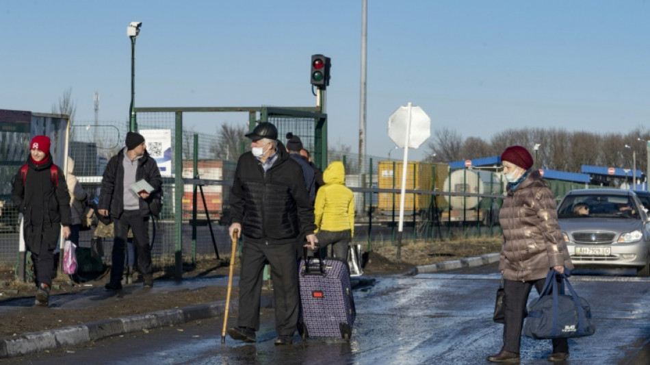 On Russia's border, evacuees from rebel-held Ukraine hope for quick return
