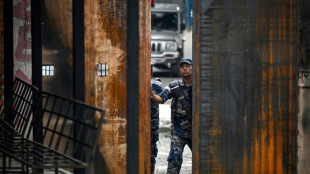 After mass Nepal jailbreak, some prisoners surrender