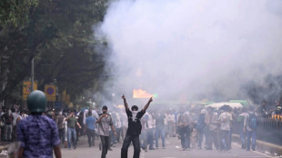 Indian police fire tear gas at exam protest march
