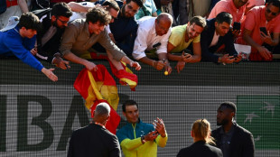 Espa&ntilde;a se rinde al "Dios" Nadal tras su victoria en Roland Garros