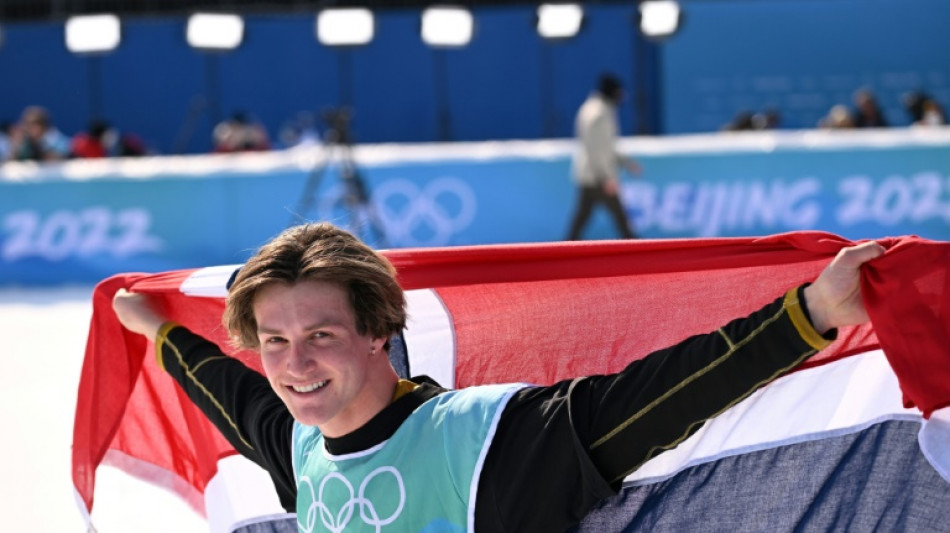 Ruud flies flag for Norway and remembers late dad with Olympic gold