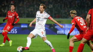 Captain Kane helps undermanned Bayern go nine clear