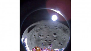 Sideways American lander sends first images back from Moon