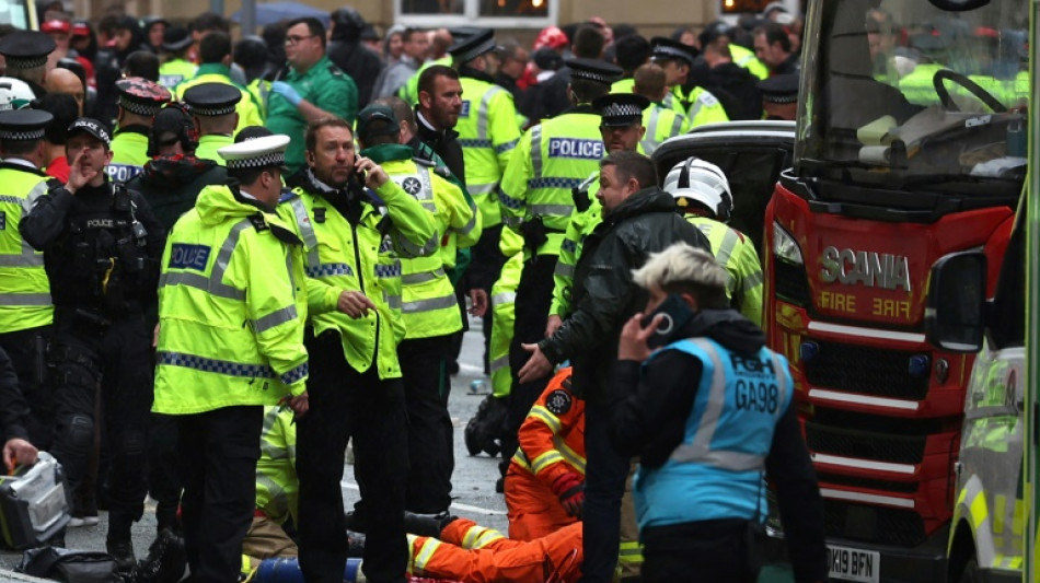 Car ramming leaves injured as Liverpool fans celebrate football triumph