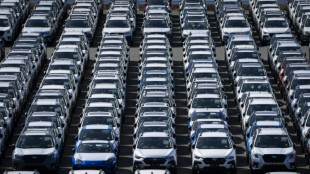 Trump signs order to lower US tariffs on Japan autos to 15%