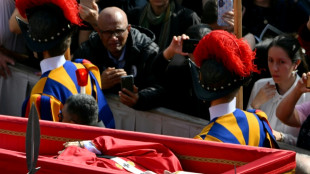 Crowds bid farewell to Pope Francis in first day of lying in state