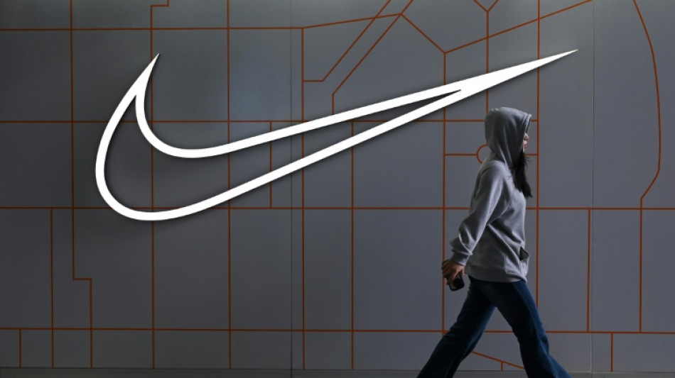 Nike profits sink but company says it is turning a corner