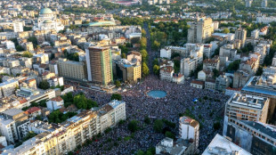 Tens of thousands rally in Serbia demanding elections