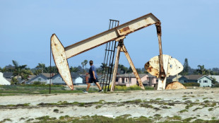 Oil gains on fresh attacks, dollar slides as inflation slows