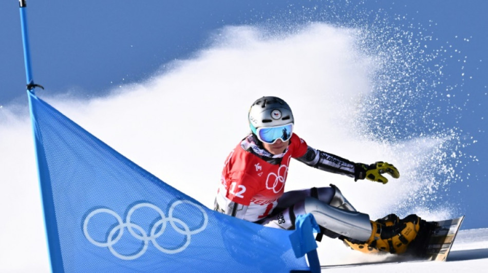 Dual champion Ledecka retains Olympic snowboard slalom crown