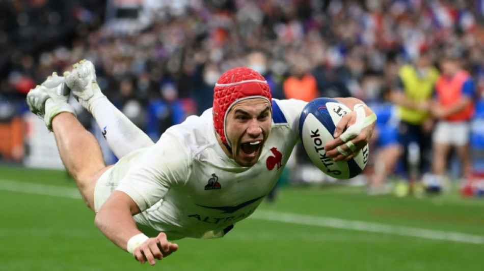 Villiere hat-trick sends France top of Six Nations
