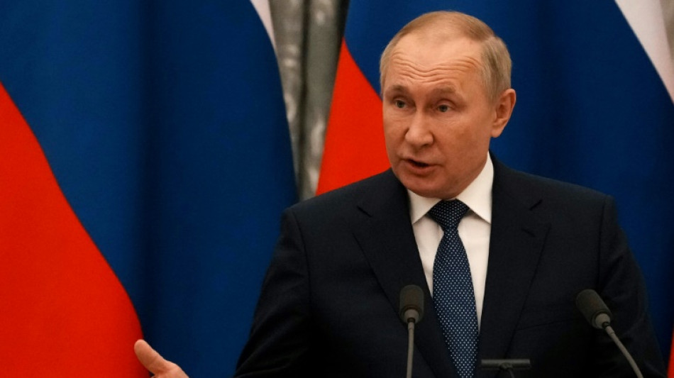 Macron in Kyiv says no 'escalation' from Putin 