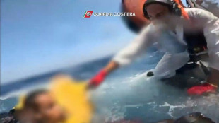 Italian authorities try to identify Lampedusa capsize victims