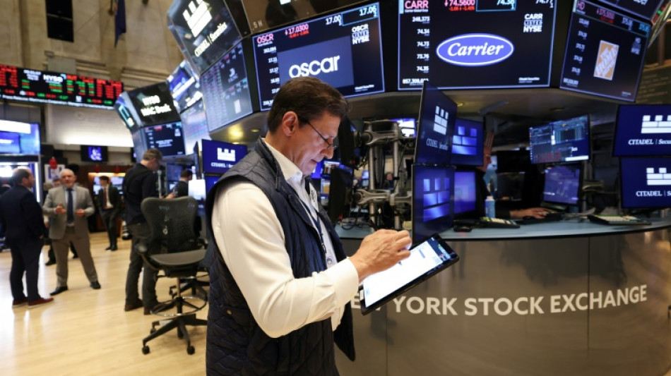 Wall Street termine pr&egrave;s de l'&eacute;quilibre, surmonte ses craintes sur le budget am&eacute;ricain