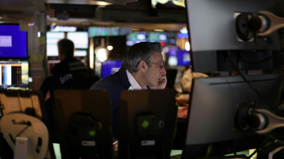 Wall Street dispers&eacute;e, entre r&eacute;sultats d'entreprises mitig&eacute;s et incertitudes commerciales