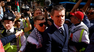 Kneecap rapper faces court on terror charge over Hezbollah flag